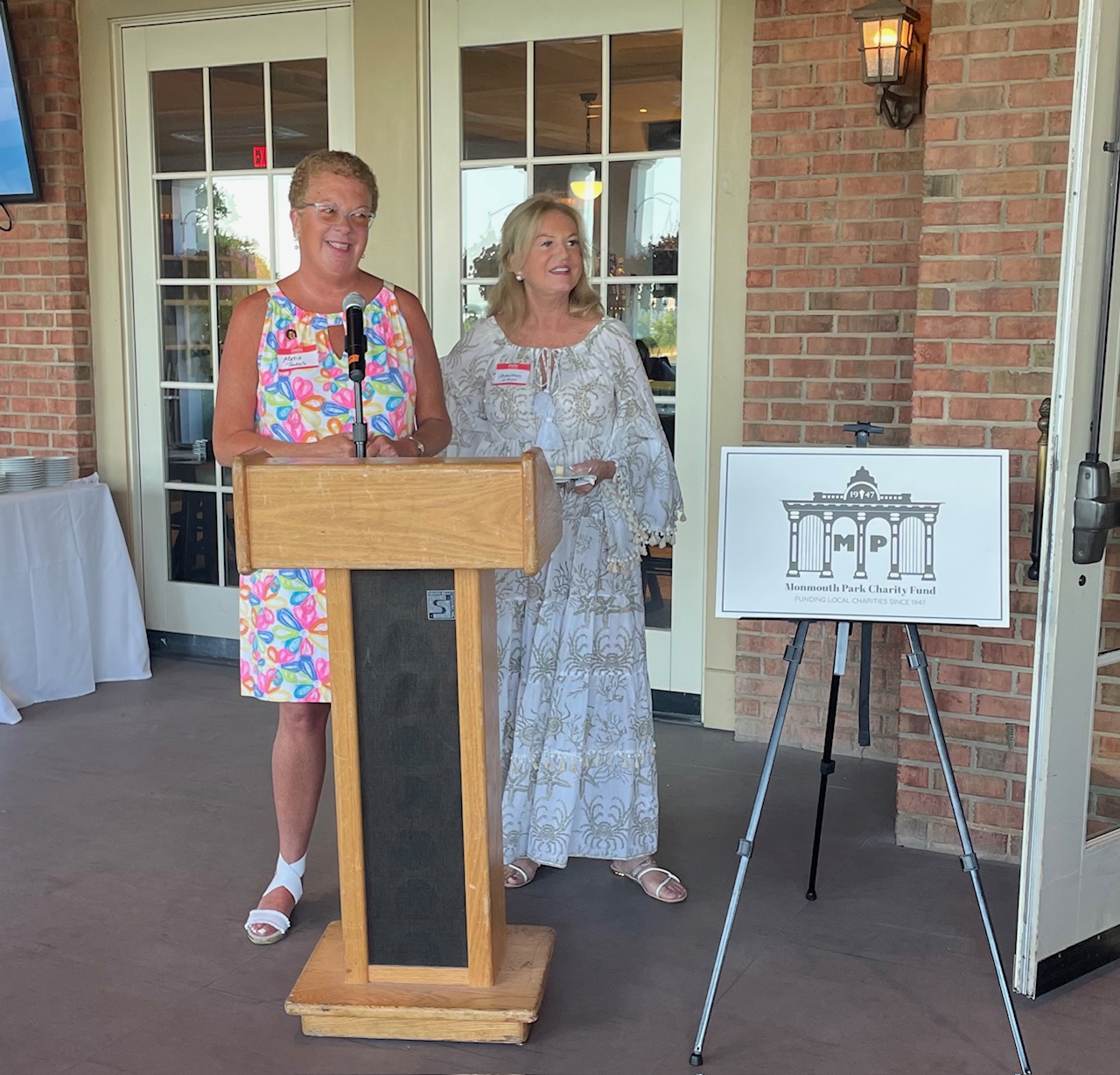 Co-Presidents of the Monmouth Park Charity Fund speaking at the Winner's Circle Society annual meeting
