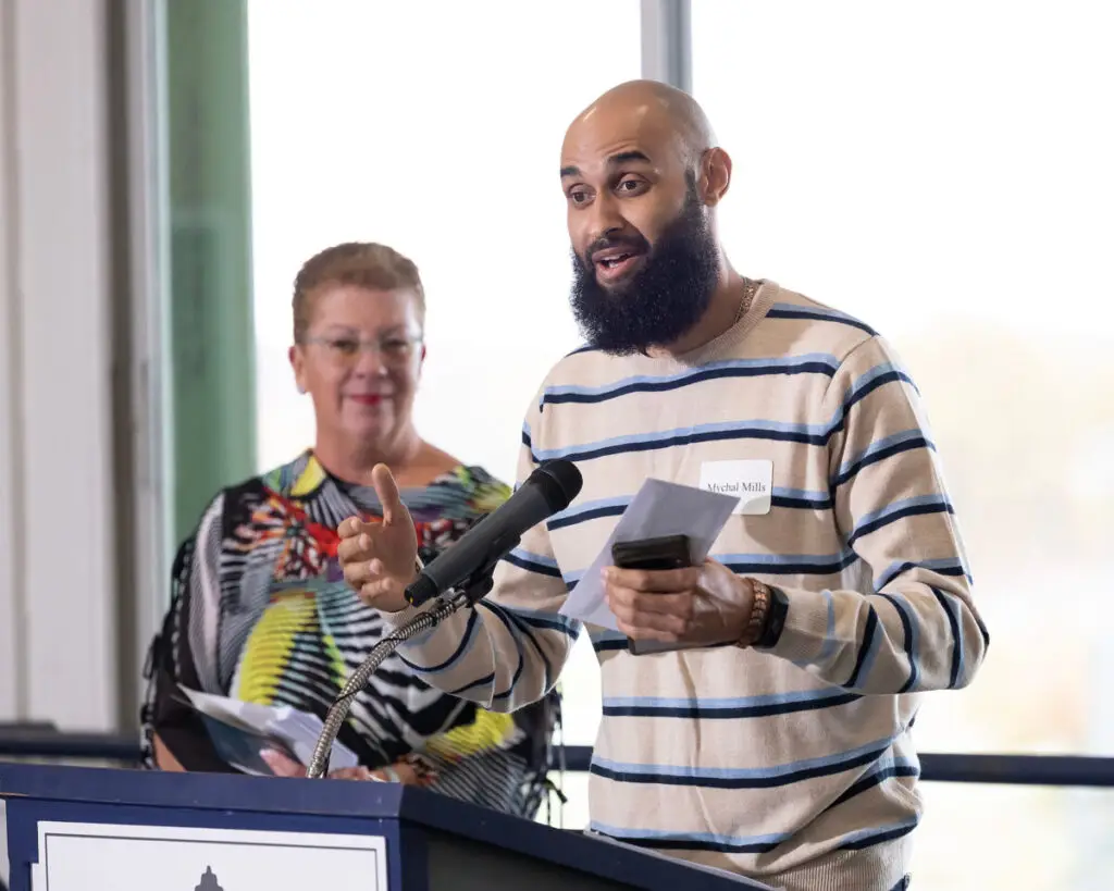 Monmouth Park Charity Fund Distribution Tea grant recipient speaking